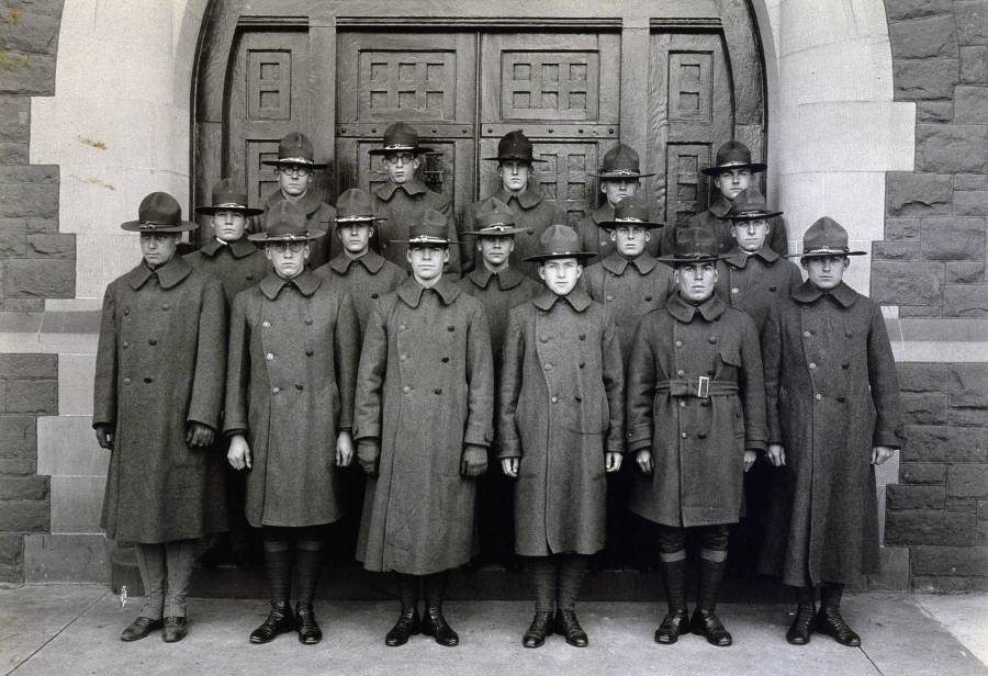 Title: Army S.A.T.C. group standing in front of Northam Towers east facade
entry, Trinity College, Hartford, CT, ca 1918 photo; Image ID:...